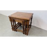 A NEST OF THREE OAK GRADUATED COFFEE TABLES