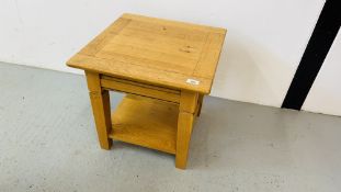 A SOLID OAK LAMP TABLE W 50CM, D 50CM.