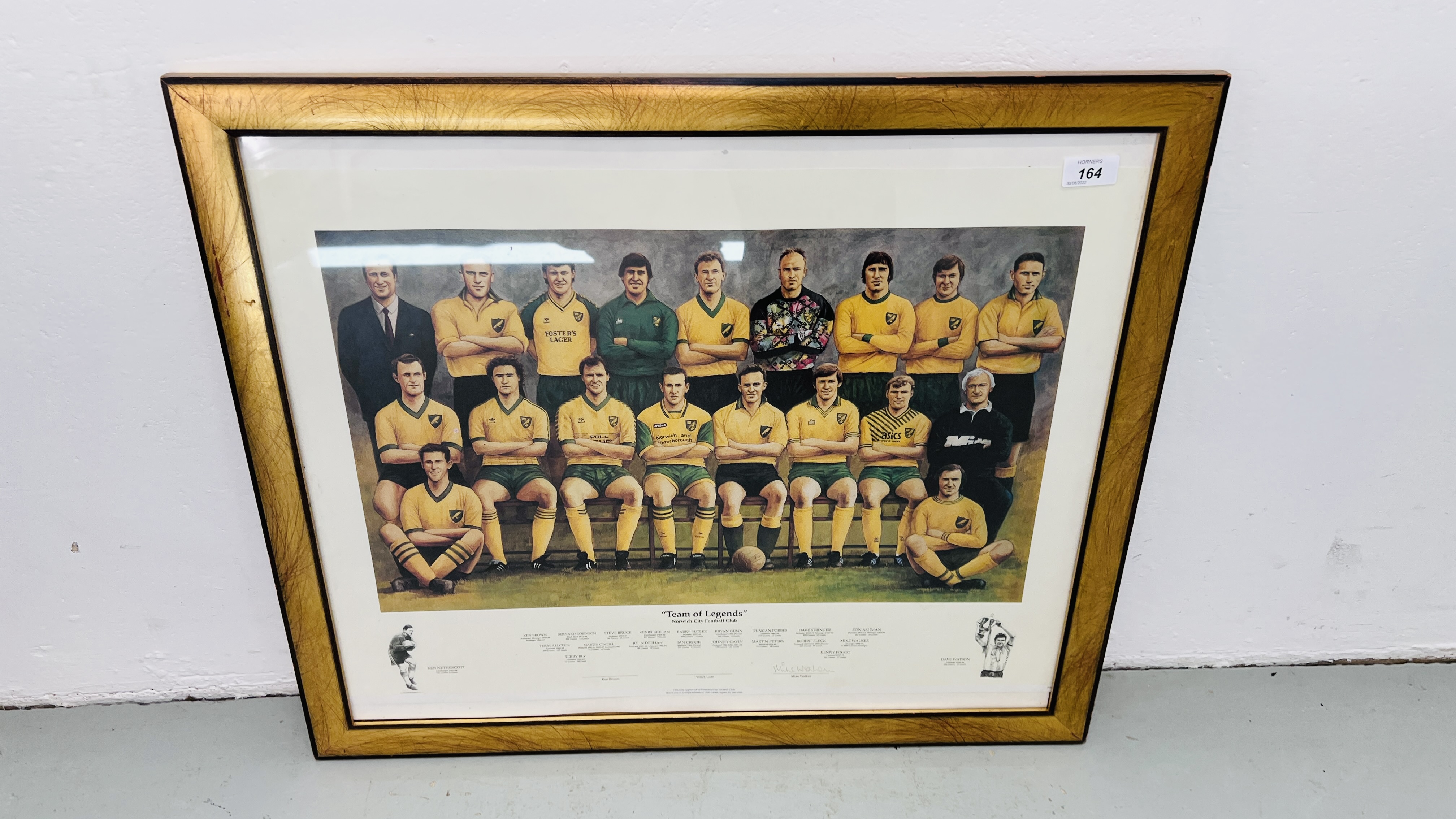 A FRAMED NORWICH CITY FOOTBALL CLUB "TEAM OF LEGENDS" PRINT 48CM X 63CM.