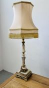 DECORATIVE ORNATE ONYX AND BRASS TABLE LAMP WITH FRINGED SHADE - SOLD AS SEEN.