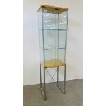 A DESIGNER DISPLAY CABINET ON CHROME STAND WIDTH 47CM. DEPTH 37CM. HEIGHT 172CM.