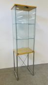 A DESIGNER DISPLAY CABINET ON CHROME STAND WIDTH 47CM. DEPTH 37CM. HEIGHT 172CM.