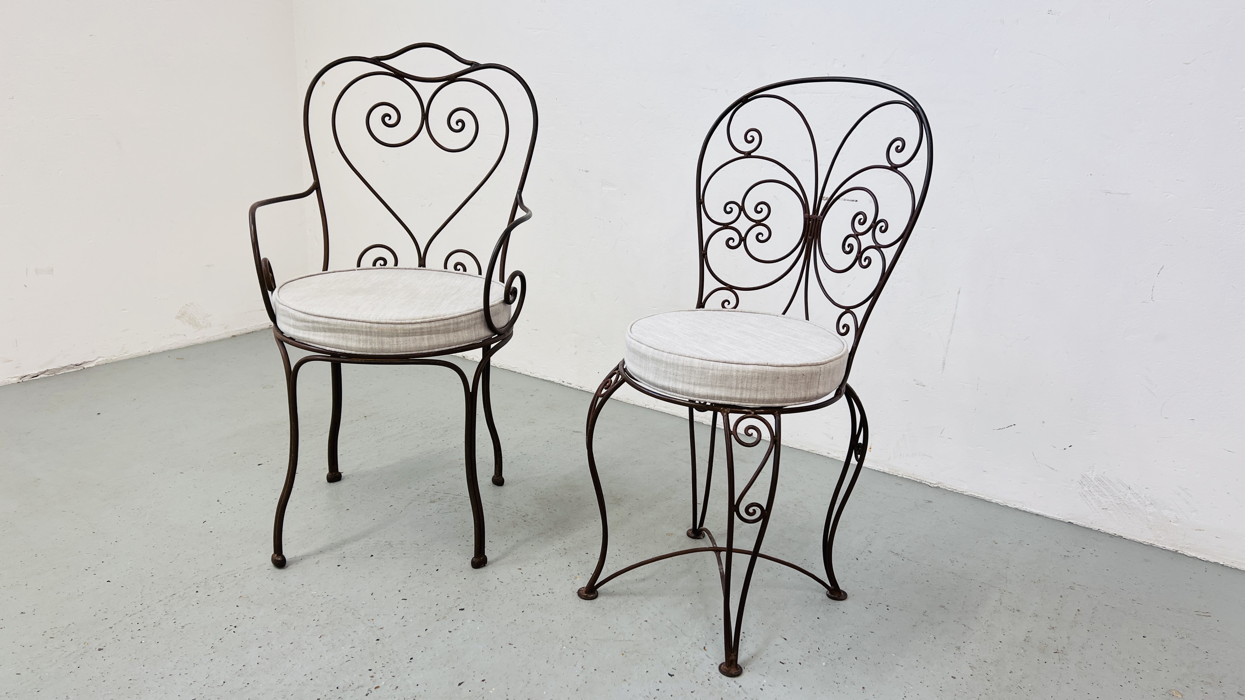 TWO FRENCH STYLE METALCRAFT CHAIRS WITH CUSHION SEATS.