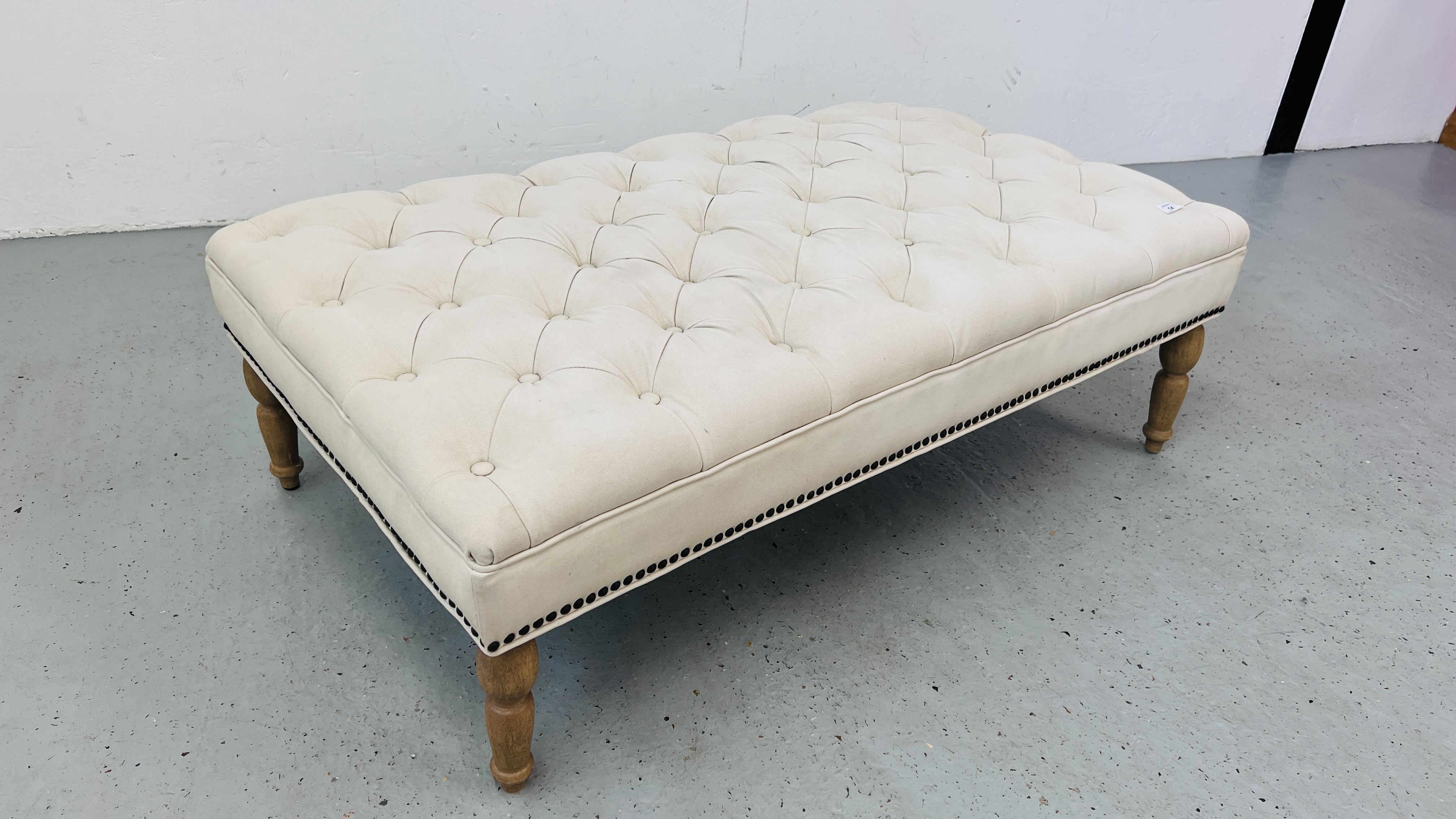 A LARGE CREAM CANVAS BUTTON BACK UPHOLSTERED FOOT STOOL 125CM X 70CM. - Image 3 of 11