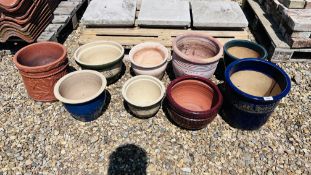 9 VARIOUS TERRACOTTA AND STONE GLAZED PLANT POTS.