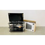A BOXED BUSH 32" FLAT SCREEN TELEVISION WITH MODERN BLACK GLASS THREE TIER STAND WITH REMOTE AND
