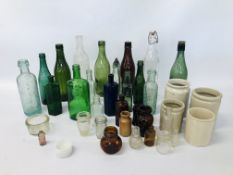 COLLECTION OF ASSORTED VINTAGE GLASS BOTTLES AND JARS TO INCLUDE SOME OF LOCAL INTEREST.