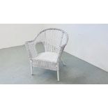 A WHITE PAINTED WICKER ELBOW CHAIR.
