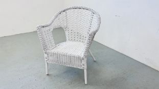 A WHITE PAINTED WICKER ELBOW CHAIR.