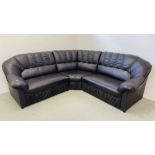 A DARK BROWN FAUX LEATHER CORNER SOFA