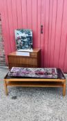 A RETRO TEAK FRAMED RECTANGULAR TWO TIER COFFEE TABLE WITH SMOKED GLASS TOP 112CM X 48CM AND A