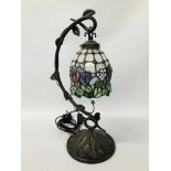 A METAL CRAFT TIFFANY STYLE TABLE LAMP WITH LEADED GLASS SHADE AND FLORAL DECORATION - SOLD AS SEEN.