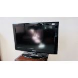 A SAMSUNG 32 INCH FLATSCREEN TELEVISION COMPLETE WITH REMOTE MODEL LE32A457C1DXXU - SOLD AS SEEN.