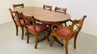 A GOOD QUALITY REPRODUCTION REGENCY STYLE TWIN PEDESTAL EXTENDING DINING TABLE AND SIX CHAIRS TABLE