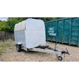 A SINGLE AXEL BOX TRAILER.