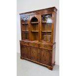 A GOOD QUALITY REPRODUCTION YEW WOOD FINISH THREE DRAWER THREE DOOR CABINET WITH PART GLAZED TOP.