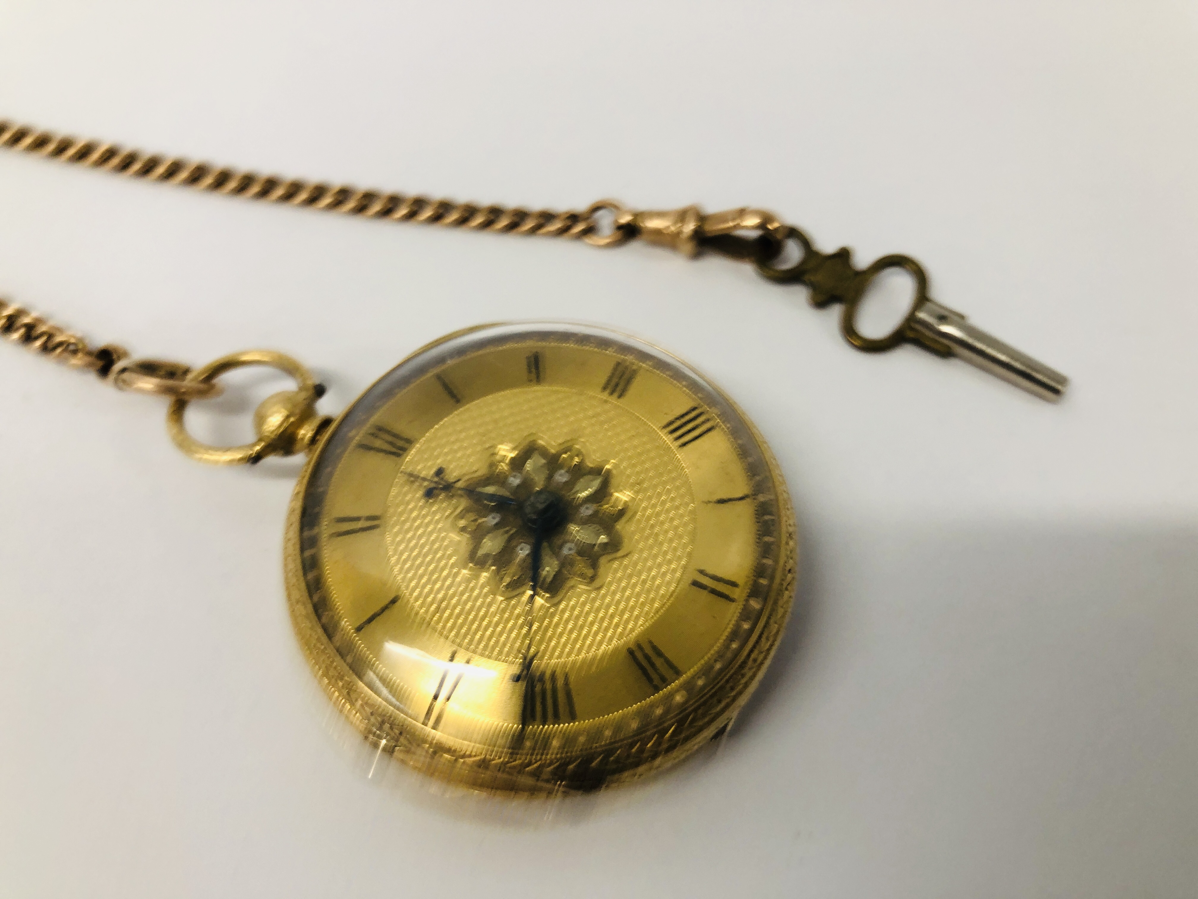 18CT GOLD CASED POCKET WATCH ON 9CT GOLD WATCH CHAIN PLUS VINTAGE YELLOW METAL FOB MARKED 10. - Image 2 of 17