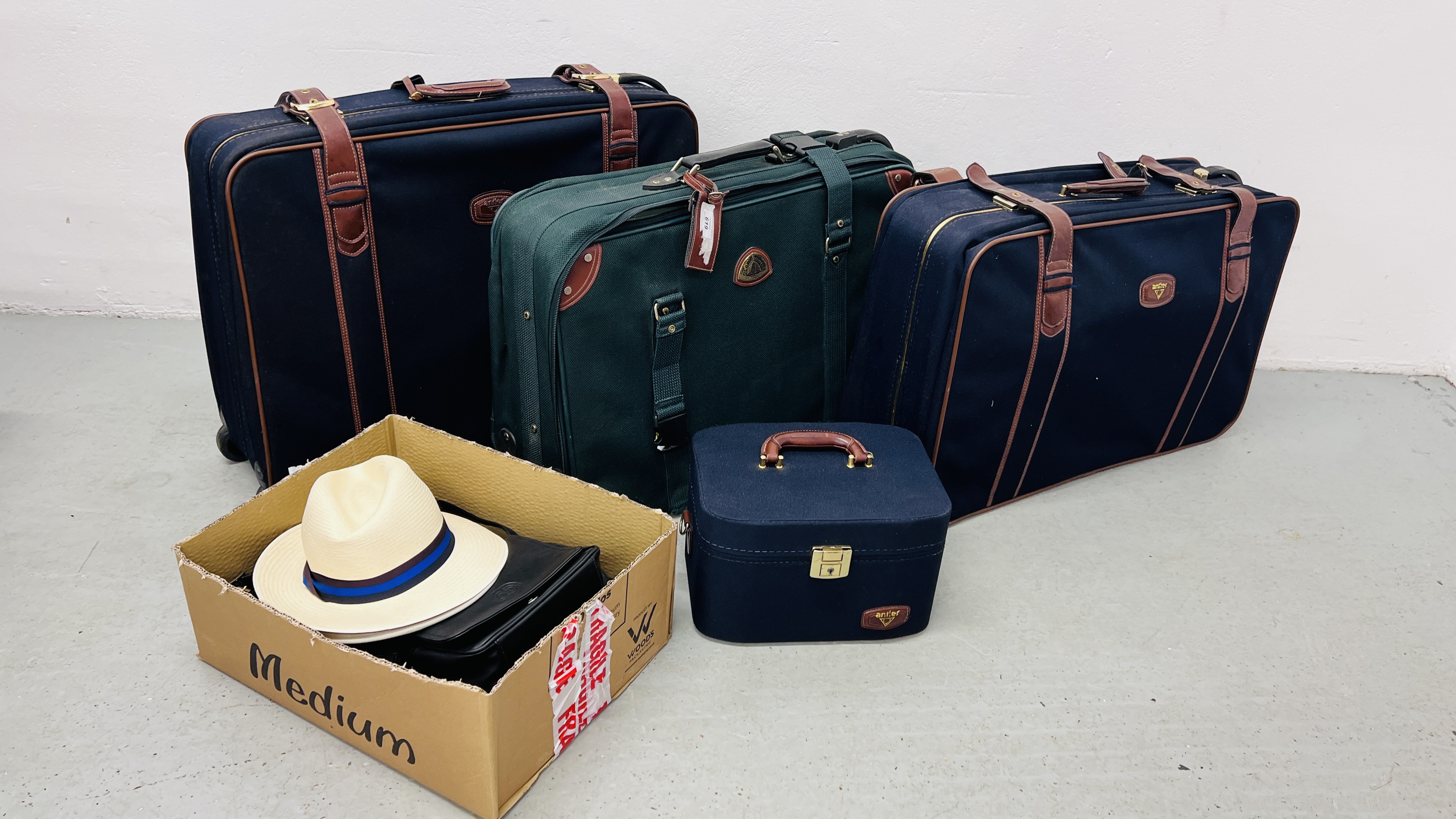 A GROUP OF LUGGAGE CASES TO INCLUDE ANTLER + GENTS ATTACHE CASE, A PANAMA HAT AND ONE OTHER,