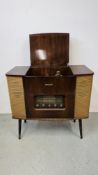 A VINTAGE WESTMINSTER RADIOGRAM WITH MONARCH RECORD DECK (COLLECTORS ITEM ONLY).