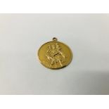 A 9CT GOLD ST. CHRISTOPHER PENDANT DIAMETER 34MM.