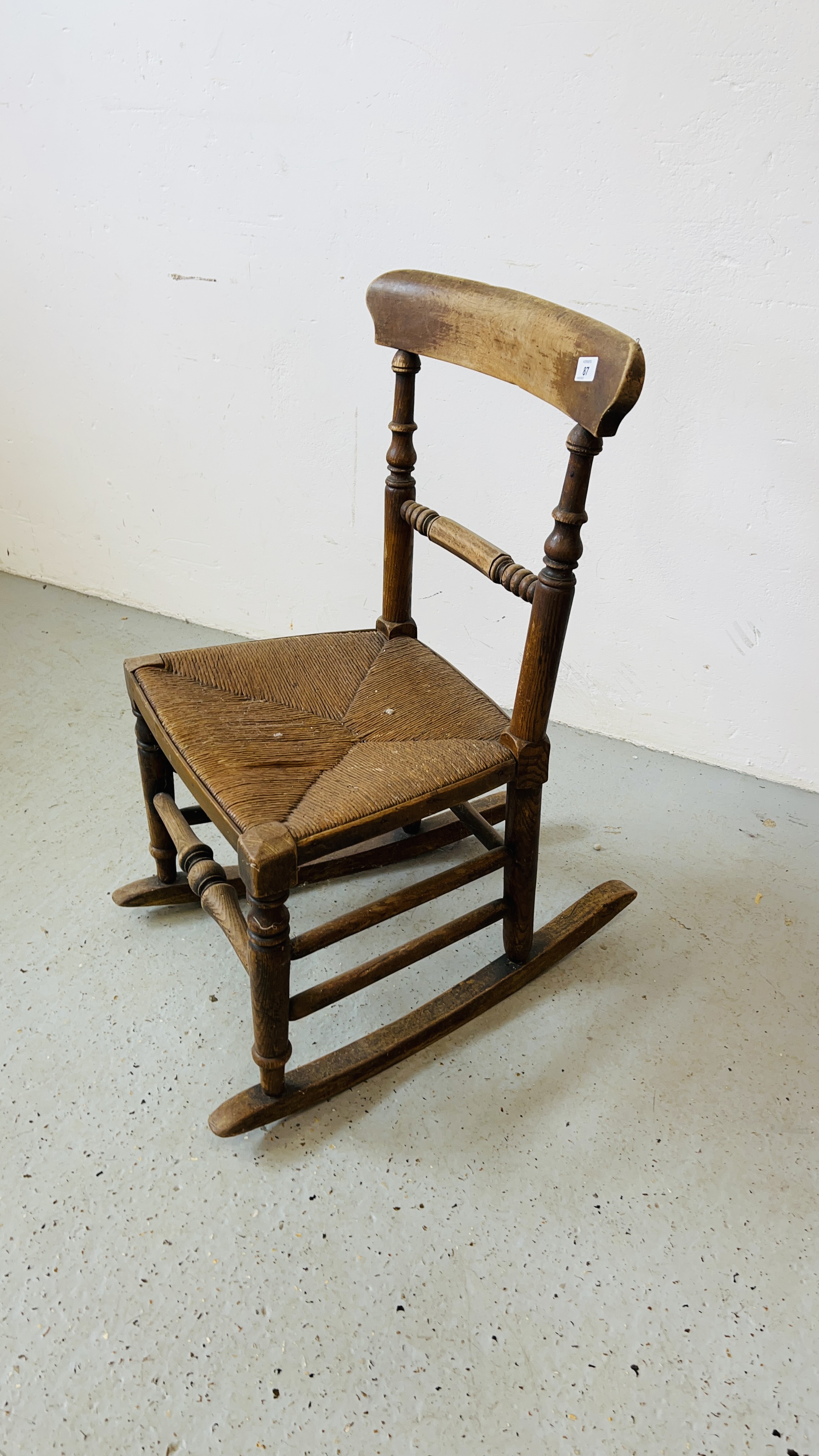 VICTORIAN OAK ROCKING CHAIR WITH REEDED SEAT. - Image 6 of 6