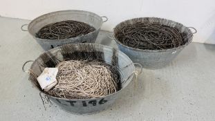 THREE LARGE GALVANISED BATHS CONTAINING FISHING LINE AND HOOKS