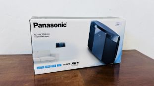 A BOXED PANASONIC COMPACT STEREO SYSTEM MODEL SC-HC195 - SOLD AS SEEN.