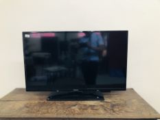 A PANASONIC 40 INCH FLAT SCREEN TV MODEL TX-40C300B COMPLETE WITH REMOTE AND INSTRUCTIONS - SOLD AS