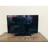 A PANASONIC 40 INCH FLAT SCREEN TV MODEL TX-40C300B COMPLETE WITH REMOTE AND INSTRUCTIONS - SOLD AS