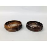 PAIR OF MAHOGANY WINE COASTERS WITH SILVER DISC INSERTS.