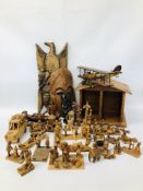 COLLECTION OF TREEN AND HARDWOOD CARVINGS TO INCLUDE TWO ETHNIC MASKS, AEROPLANE CD RACK ETC.
