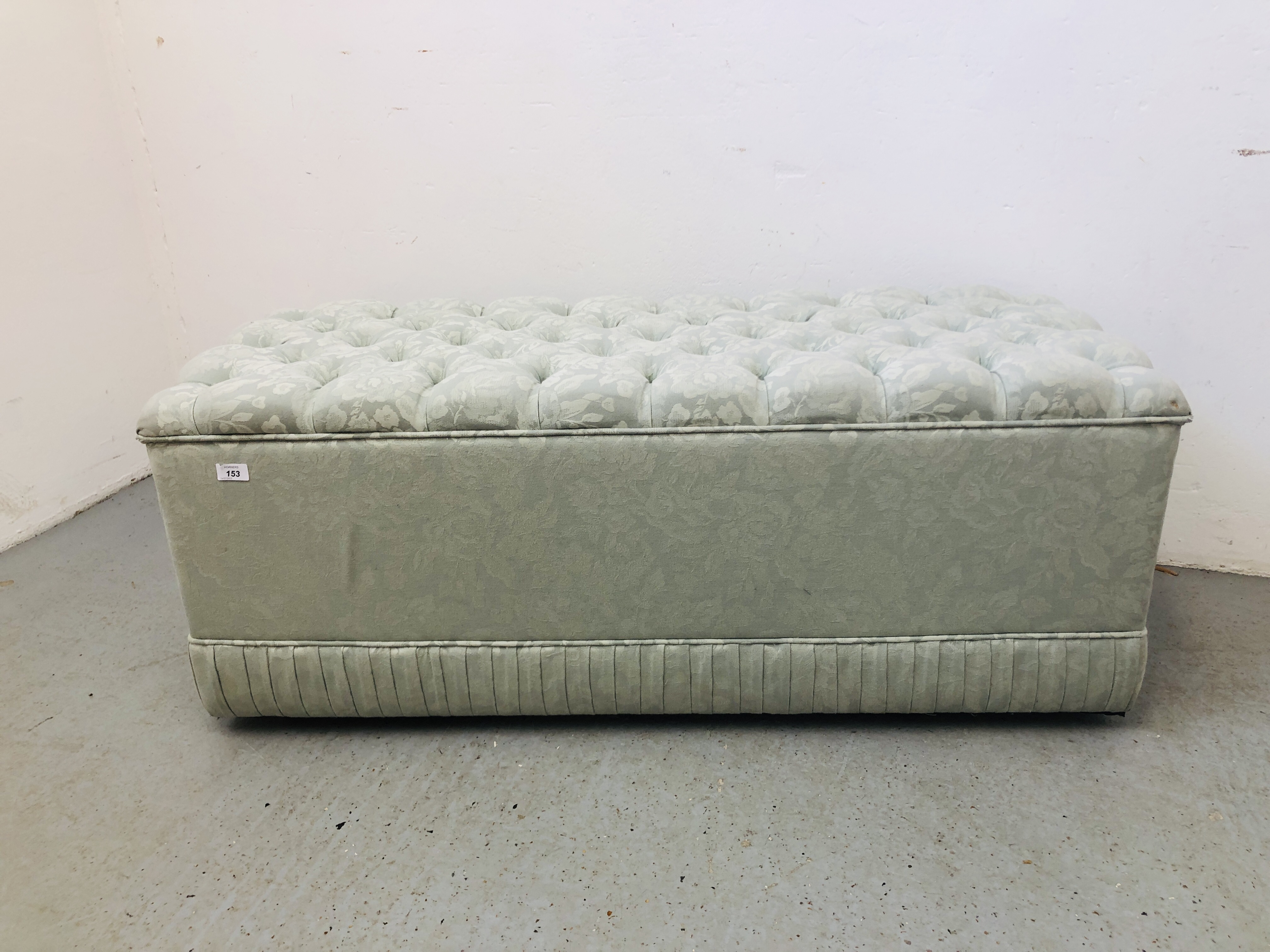 GREEN UPHOLSTERED OTTOMAN L 123CM, D 49CM, H 49CM.