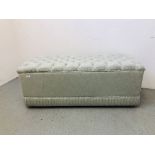 GREEN UPHOLSTERED OTTOMAN L 123CM, D 49CM, H 49CM.