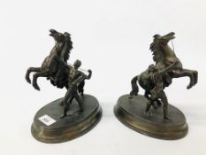 PAIR OF VINTAGE SPELTER BUCKING STALLIONS ON AN OVAL BASE, BRONZE EFFECT FINISH, H 22CM.