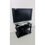 PANASONIC 32 INCH TV COMPLETE WITH PANASONIC DVD VIDEO COMBO AND MODERN BLACK GLASS STAND - SOLD AS