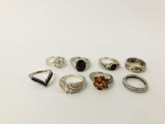 8 X ASSORTED SILVER RINGS.