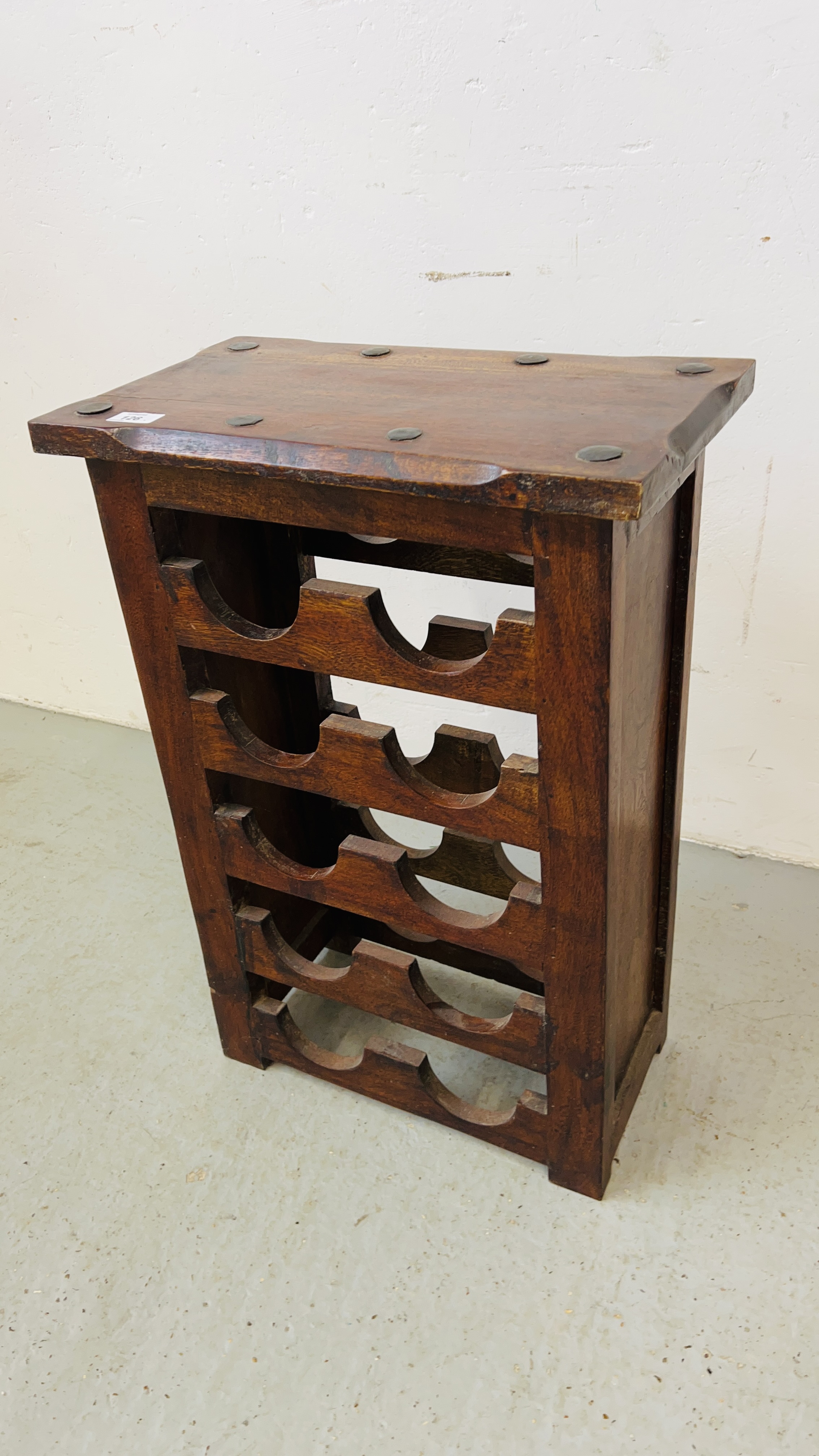 A RUSTIC HARDWOOD 10 BOTTLE WINE RACK H 67CM, W 46CM.