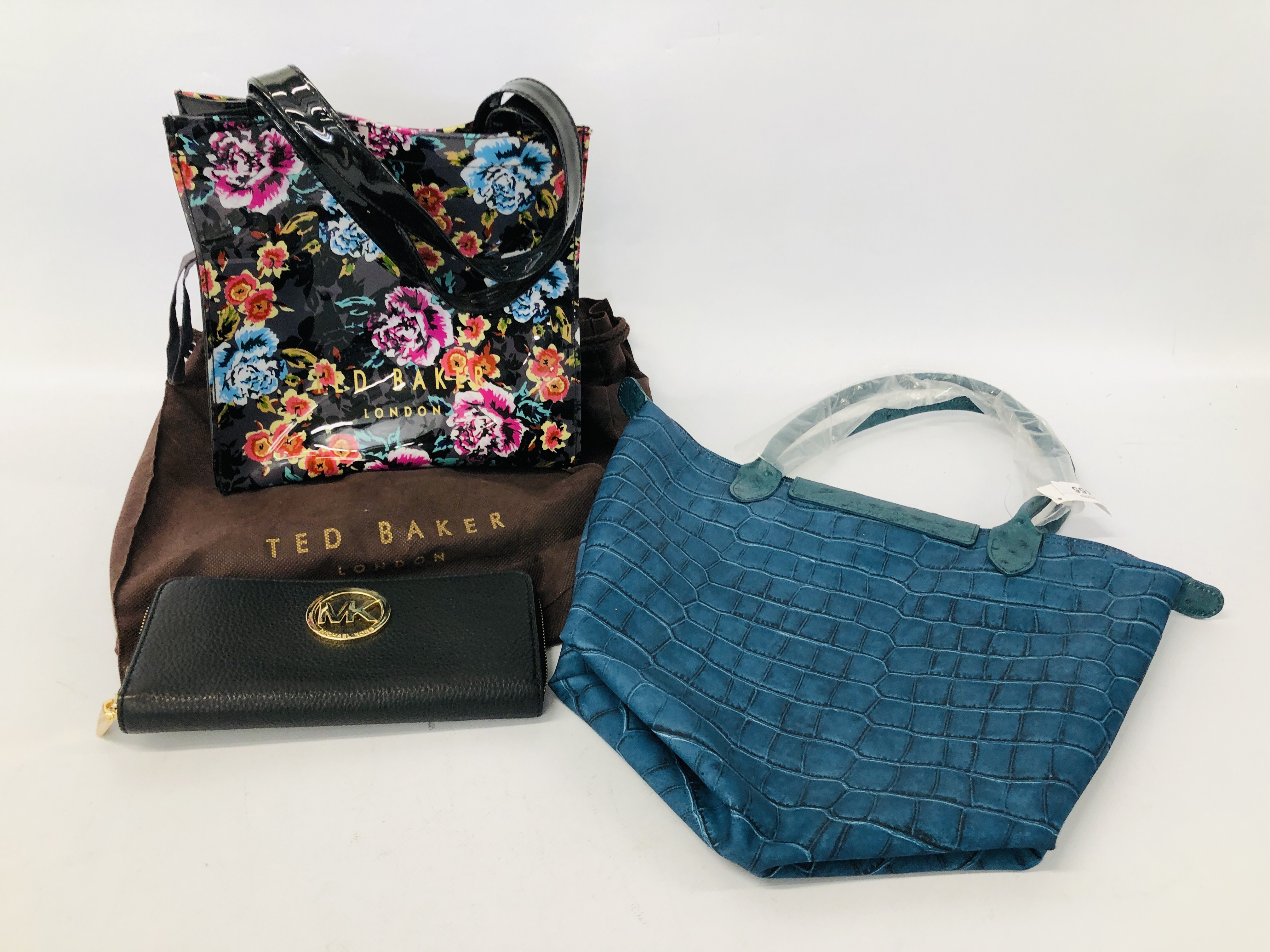 A BLUE SHOULDER BAG MARKED LO PLIAGE ALONG WITH FLORAL PATTERNED BAG AND UMBRELLA MARKED TED BAKER