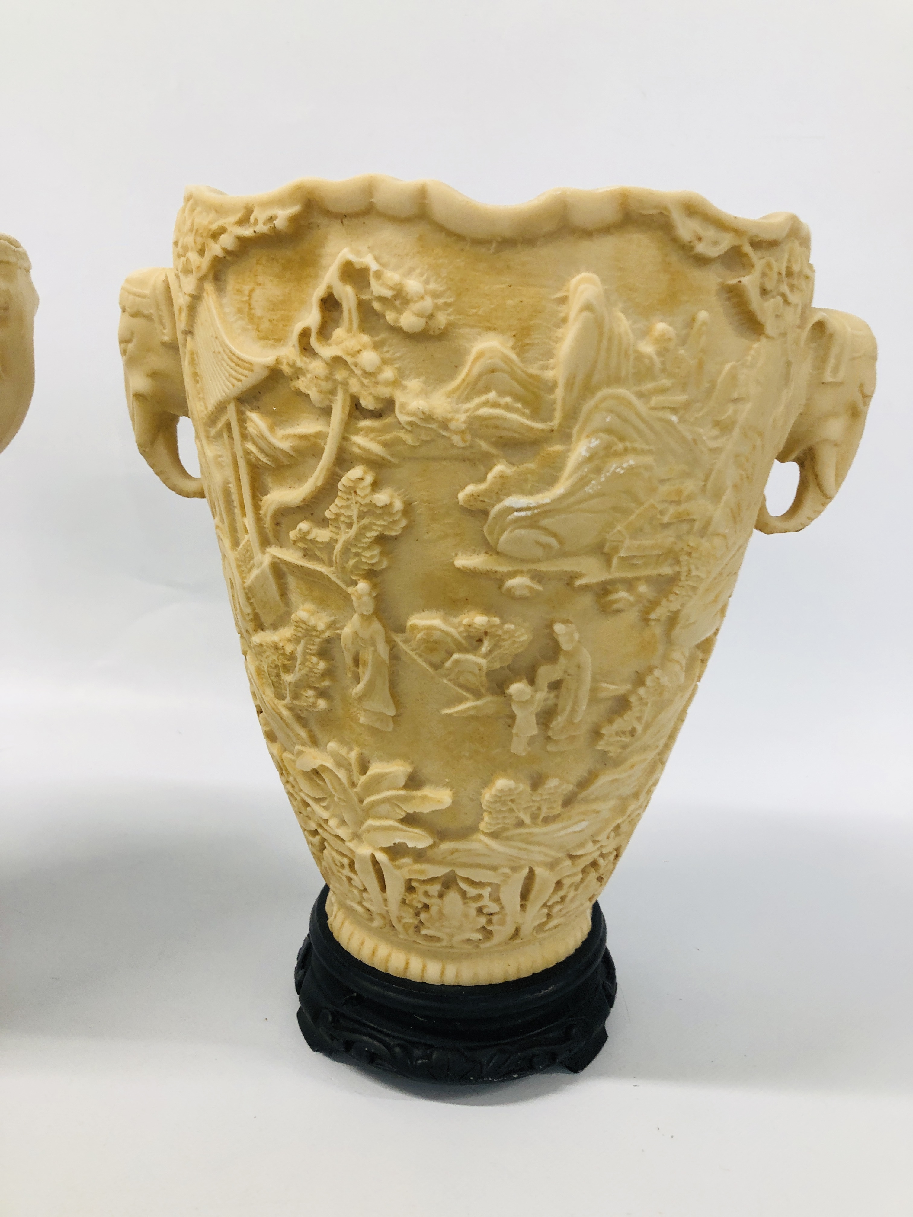 A PAIR OF RESIN DECORATIVE URNS WITH ELEPHANT HEAD DETAIL AND INTERCASE CARVED DESIGN HEIGHT 31CM. - Image 2 of 6