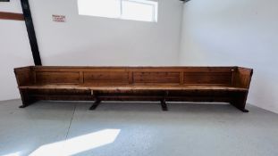 AN ANTIQUE PINE CHAPEL PEW LENGTH 4.