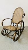 VINTAGE BENTWOOD ROCKING CHAIR WITH RATTAN SEAT AND BACK.
