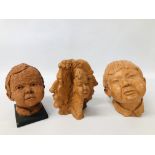 TWO STUDIO POTTERY CHILD BUSTS ALONG WITH A STUDIO POTTERY FOUR DIMENSIONAL FACE SCULPTURE BEARING