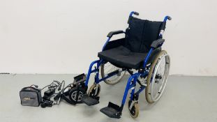 A ENIGMA WHEEL CHAIR IN BLUE FINISH ALONG WITH 100 WATT DRIVE MOTOR - SOLD AS SEEN.