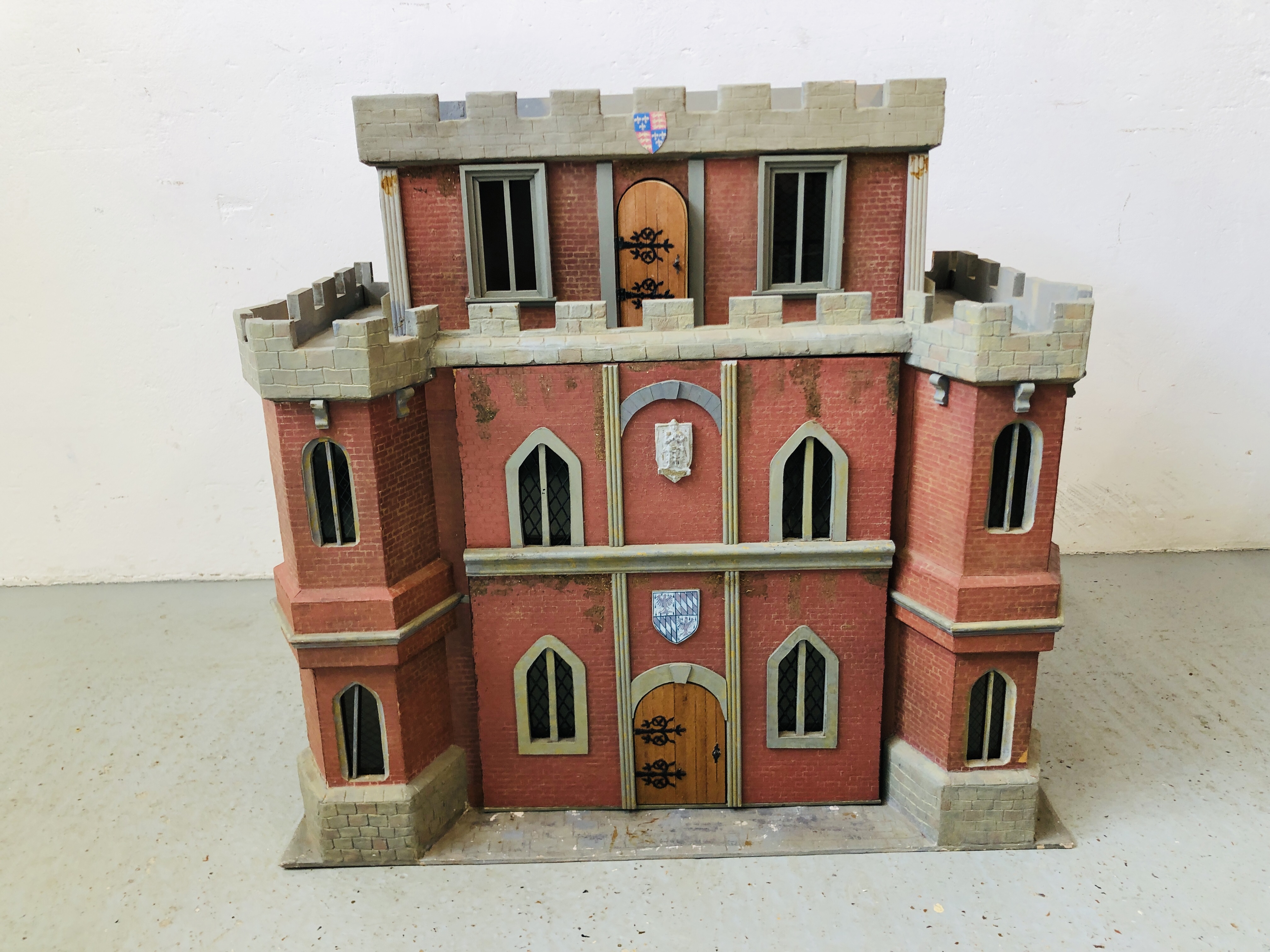 A DOLLS HOUSE "CASTLE" W 83CM, D 45CM, H 78CM.