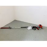 A MITOX LONG REACH PETROL HEDGE TRIMMER - SOLD AS SEEN.