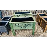 A PAIR OF RUSTIC RECTANGULAR RAISED PLANTERS WITH STENCILED BIRD DETAILING AND PLASTIC LINER,