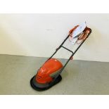 A FLYMO HOVER VAC 250 25CM COLLECT LAWN MOWER 1400W + ADDITIONAL BOXED BLADE - SOLD AS SEEN.