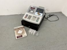 A SHARP XE-A203 ELECTRIC CASH REGISTER COMPLETE WITH INSTRUCTIONS AND TILL ROLLS,