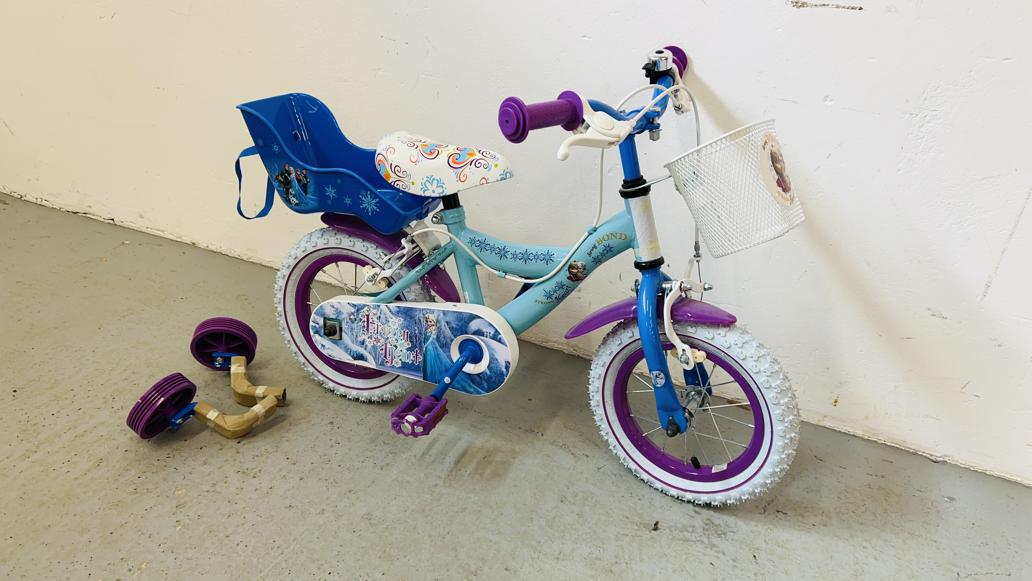 AN AS NEW GIRLS BIKE WITH STABLISIERS "FROZEN" RELATED.