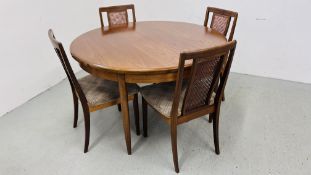 A MID CENTURY G PLAN CIRCULAR TEAK EXTENDING DINING TABLE AND FOUR CHAIRS D 122CM.